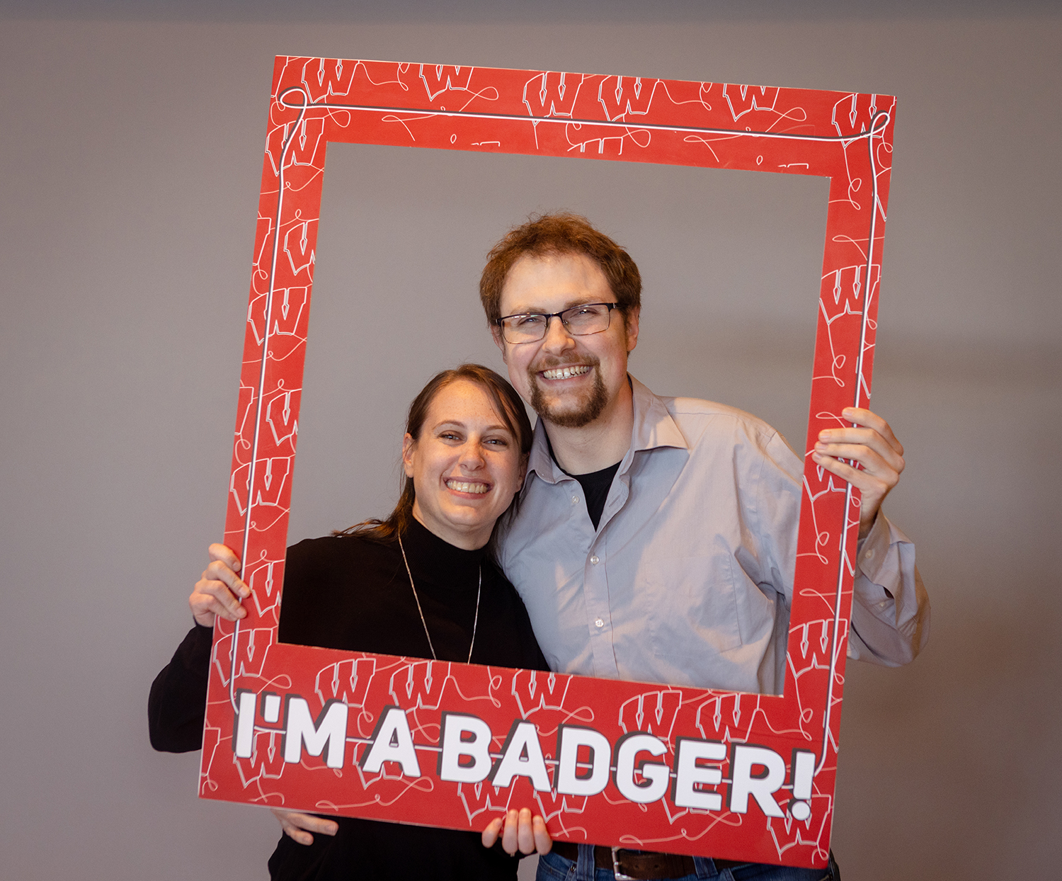 Student and guest in "I'm a Badger" frame
